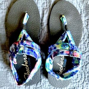 Tie dyed sandals.
